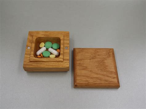 small wooden pill box